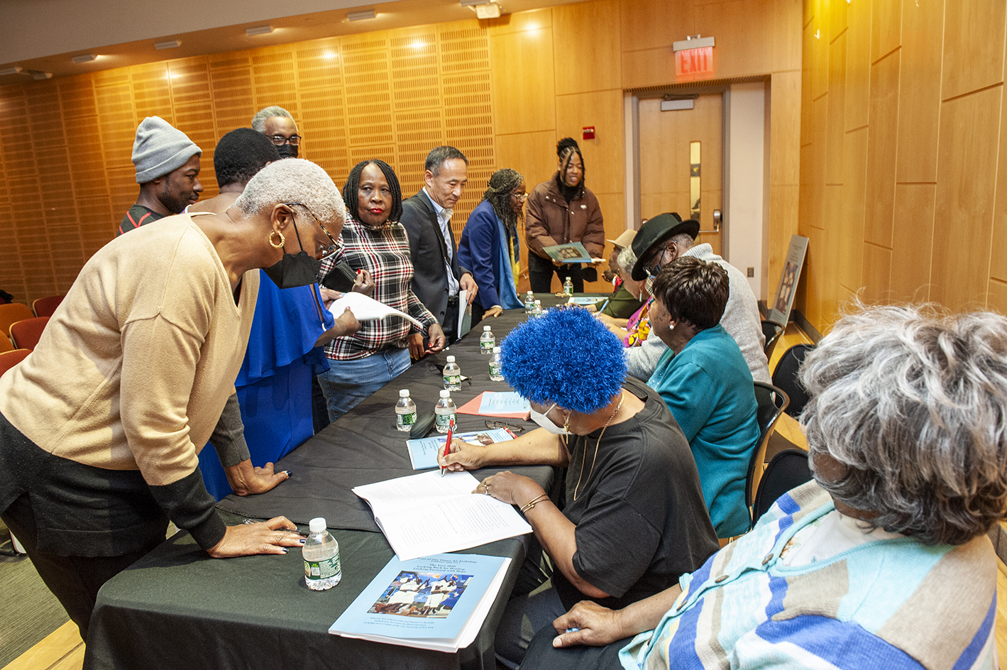 Tales of Our Times Anthology Book Launch at Medgar Evers College, December 2022. Members of the Dr. Edith Rock Writing Workshop for Elders Sign Books.