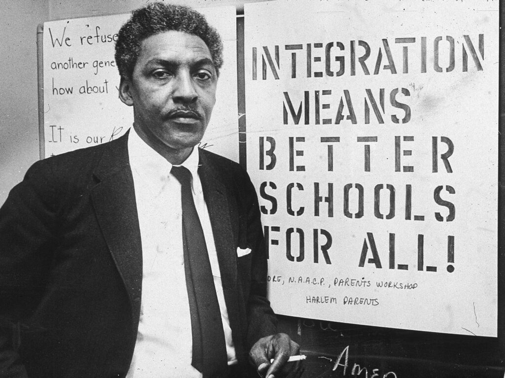 2nd February 1964:  American civil rights activist Bayard Rustin (1912 - 1987), spokesman for the Citywide Committee for Integration, at the organization's headquarters at Silcam Presbyterian Church, Brooklyn, New York City.  (Photo by Patrick A. Burns/New York Times Co./Getty Images)